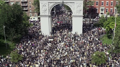 NEW YORK - JUNE 6, 2020: protestors yelling no justice no peace at Black Lives Matter rally under arch in Washington Square Park in Manhattan, NYC.