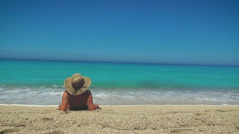 Woman enjoying the beach at Greek island resort