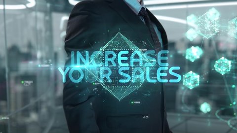 Businessman with Increase Your Sales hologram concept