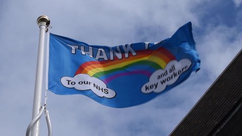Littlehampton, West Sussex, UK, July 01, 2020, Thank You rainbow flag for the NHS and Key Workers fluttering in the breeze outside the council offices in Littlehampton.