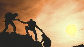 business. teamwork helping hand business travel silhouette concept. group team tourists lends helping hand climb cliffs mountains helping hand. teamwork people climbers climb top overcoming hardships
 - Powered by Shutterstock - Get 15% off with code: PIKWIZARD15