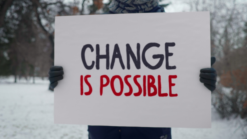 CHANGE IS POSSIBLE poster, zoom in. Politics, no racism, protest, violence, Bad politicians are not forever Royalty-Free Stock Footage #1055265158