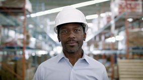 Portrait of a frontline essential worker in a warehouse. Shot in slow-motion and 4k.  - Powered by Shutterstock - Get 15% off with code: PIKWIZARD15