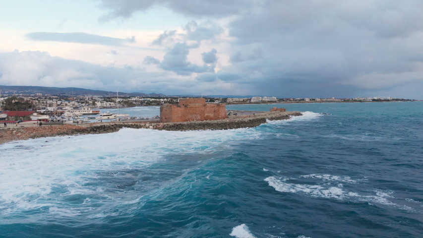 Aerial drone view of Pathos Castle on Mediterranean seashore in Cyprus island.