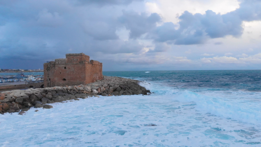 Aerial drone view of Pathos Castle on Mediterranean seashore in Cyprus island.