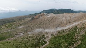This is a drone aerial view of the vicinity of the crater where Shiranesan Yukama in Kusatsu, Japan, is not covered by volcanic regulations.