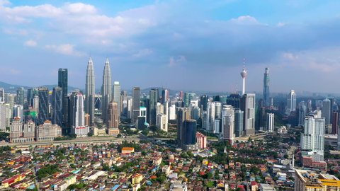Petronas Twin Tower Kuala Lumpur Malaysia Aerial Cinematic With Beautiful Sky 4K Drone Footage