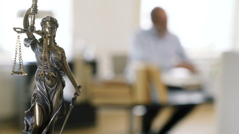 The Statue of Justice - lady justice, the Roman goddess of Justice in lawyer office