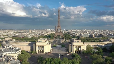 France Paris drone shot, aerial view flying over Trocadero looking at Tour Eiffel (Eiffel tower), cloudy. Cityscape foreward view