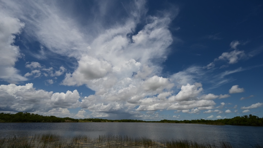 Timelapse of clouds forming over Nine Mile Pond in Everglades National Park, Florida in summer 4K.
