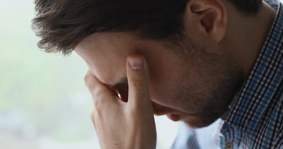 Close up view troubled man bowing his head cover face with hands crying due life grief sorrow, personal troubles, alcohol abuse drug addicted desperate guy need help. Break up, health problems concept | Shutterstock HD Video #1055363126