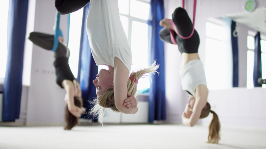 yoga with cloth hanging
