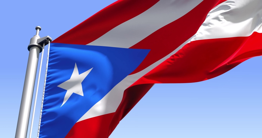 Puerto Rico flag on a flagpole waving in the wind in the sky. Wonderful intro for yor projects. The Commonwealth of Puerto Rico. Royalty-Free Stock Footage #1055373596