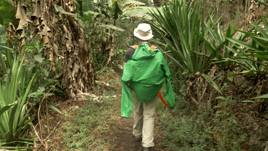 Travelers walking along Inca Trail of Machu Picchu, Aguas Calientes, Cusco, Peru.