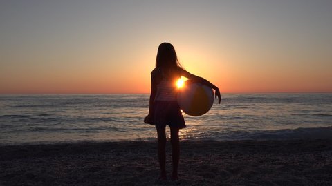 Kid on Beach at Sunset, Child Playing with on Seashore, Girl Silhouette on Coastline Watching Sea Waves
