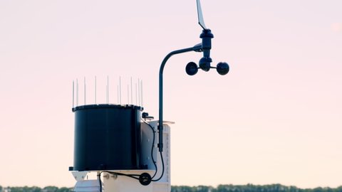 close-up of meteorological instrument. A small weather station on a farm field, near the irrigation tank. The concept of smart farming technology
