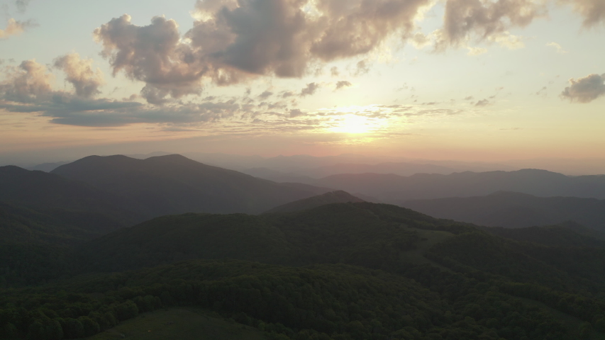 Stunning sunrise over Appalachian mountains. Aerial parallax right