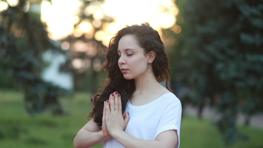 girl praying folded her hands prayer Stock Footage Video (100% Royalty ...