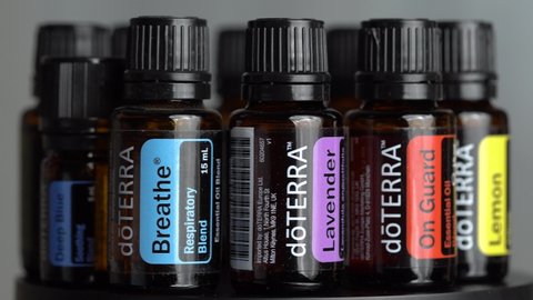 Pecs / Hungray - July 02 2020 - Illustrative editorial video of Doterra Essential Oils for everyday use on a dark shiny background