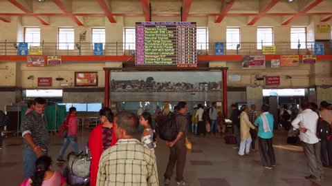 Varanasi, India - Circa October 2019. People at the Varanasi Junction railway station.