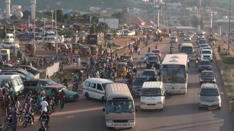 Busy street with people ,cars, trucks and Motorcycle in rush hour on a busy road in Nyanyan,Federal capital territory Abuja, Nigeria west Africa.Shot on 05/06/2020