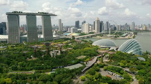 Drone Aerial view 4k Footage of Gardens By The Bay, Flying Towards Skyline Singapore. Marina Bay In Singapore.