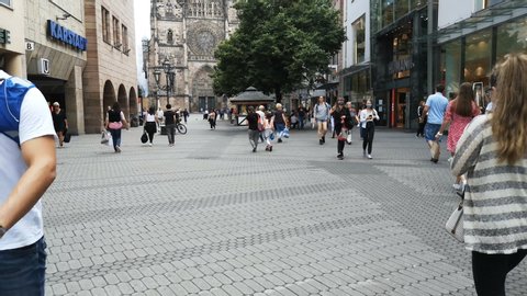 Nuremberg,germany - july 4 2020: People crowd walking for shopping with protective masks in corona virus pandemic time,nuremberg city lifestyle
