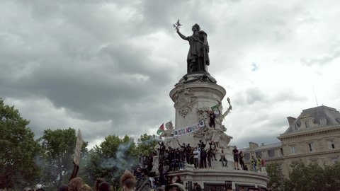 Paris , Ile De France / France - 06 13 2020: Shot of Protesters on Place de la république Statue During the Black lives Mater Protest in Paris France