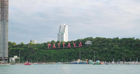 The famous Pattaya city sign on the hill at Bali Hai Pier in Chonburi. Pattaya is famous city for beaches, tourist destinations and nightlife.
