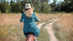 Adorable Cyclist Girl Wearing Dress Workout.Vacation Holiday Fun Sport.Cyclist Happy Woman On Bicycle.Hair Blowing When Girl Cycling.Handsome Female Cycling On Bike.Beautiful Woman Hair Fluttering. 