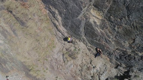 Dehradun, Uttarakhand/India- June 1 2020:  Mountaineers rescue injured person from the mountains with the   help of rope  Rappelling method .