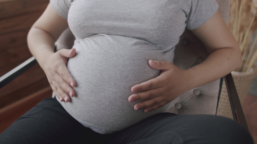 movement camera around pregnant belly which Stock Footage Video (100%