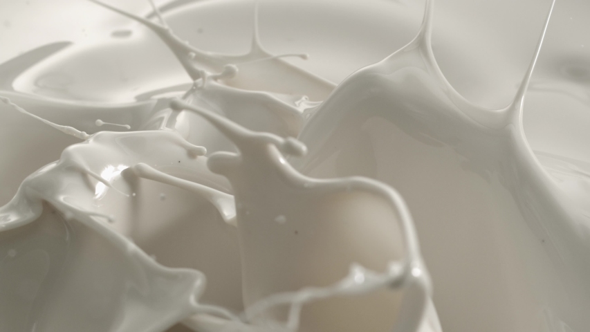 Cream Milk Splashing Macro Shot on Phantom Camera 4K | Shutterstock HD Video #1055534213