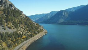 Bird´s Eye view of the Columbia River Highway in Oregon / Washington and of the home valley park in autumn with colorful yellow and orange trees 