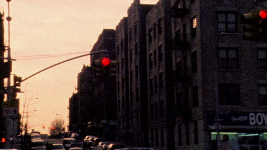 2019: Retro looking footage filmed on Super 8 in New York City Vintage looking footage filmed at the Bronx at Grand Concourse and 184th Street intersection Royalty-Free Stock Footage #1055545346