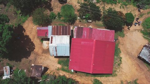 Daytime drone flight in ascending zenith over an isolated house located in Laguneta, within the mountains of Miranda State, Venezuela