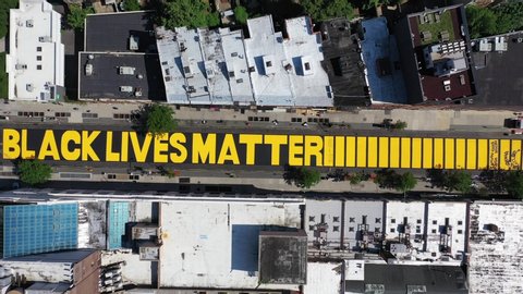 Brooklyn , New York / United States - 06 19 2020: An aerial shot over the Black Lives Matter mural on Fulton Street in Brooklyn