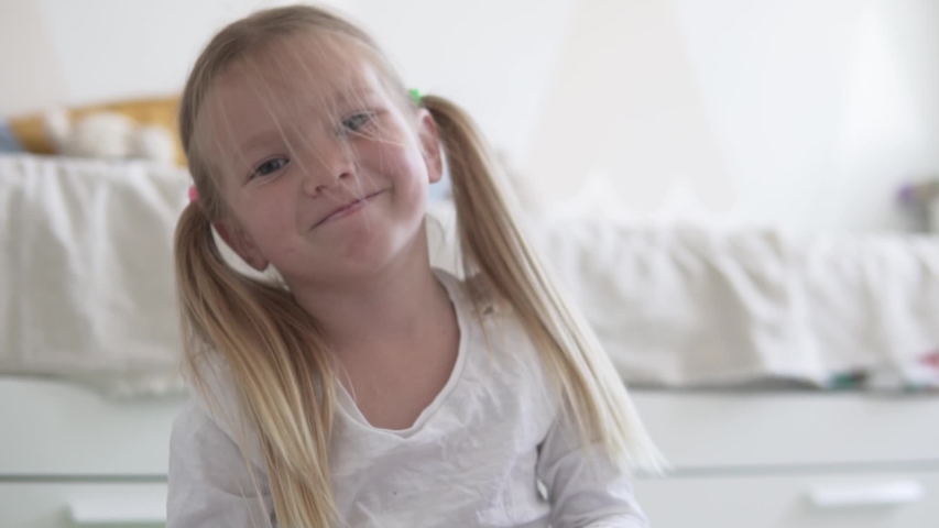 Close-up of blonde girl 4 years old.