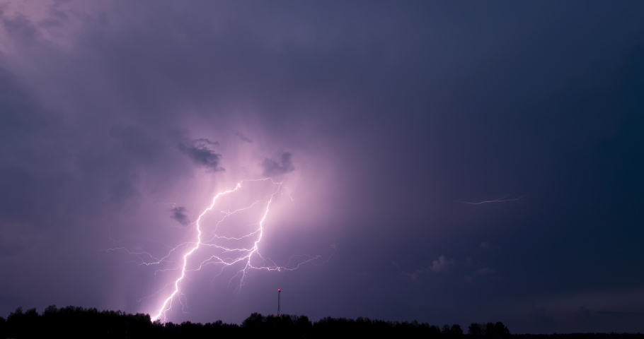 Abstract Dark Night Thunder Clouds with Lightning Strikes and Moon