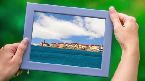 Town Piran in frame with moving clouds