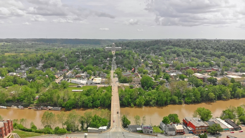 Aerial view of downtown Frankfort, KY with the State Capitol building