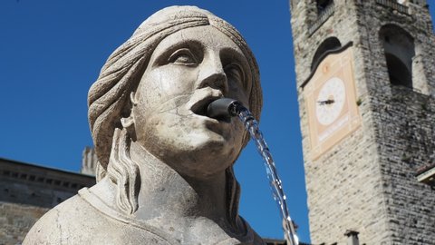 Bergamo, Italy. Close-up of the sphinx from whose mouth the water of the fountain flows. The Contarini fountain located at the main square at the old town. Best monument of the to city