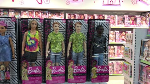 Odessa/Ukraine-06/28/2020: In a toy store on a shelf, a collection of new Barbie dolls of different multi-ethnic groups and races is sold for children. Friendship of the peoples of the whole world. 