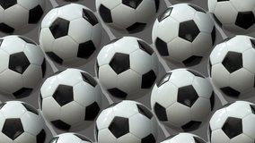 Large group of soccer balls. 
Balls rotate around their axes. Flat lay, top view. Isometric view. Seamless loop video. 
