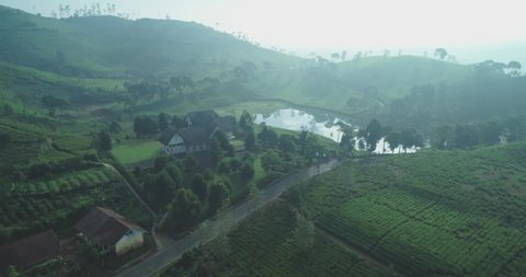 Established Aerial View of Lakeside Villa with Germany Architecture Design At Cukul Pangalengan, Pengalengan, West Java Indonesia స్టాక్ వీడియో