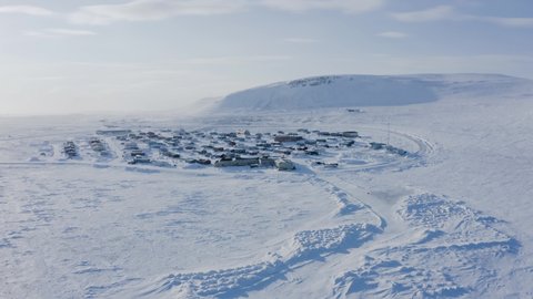 On of the most northern and extreme towns or small cities which lies in the middle of the arctic, close to the north pole surrounded by ice, snow, glacier and endless white with extreme weather