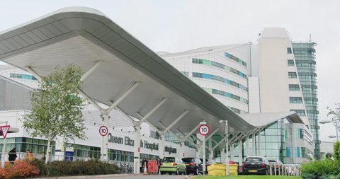 BIRMINGHAM, UK - 2020: The front of the Queen Elizabeth hospital on a bright, but overcast day.