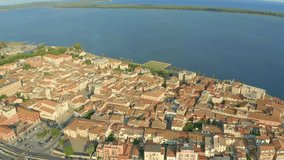 aerial view of the seaside town of orbetello on the coasts of the tuscan maremma video edited vivid color