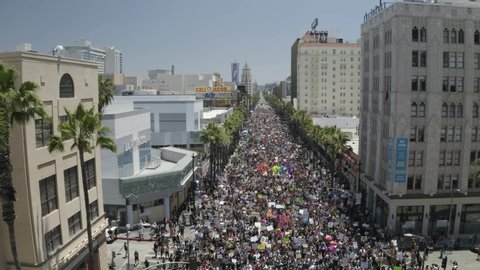 Los Angeles , California / United States - 06 14 2020: Flying Above Crowd in All Black Lives Matter and Gay Pride Festival March on Hollywood Boulevard, Together Against Police Brutality and For Equal