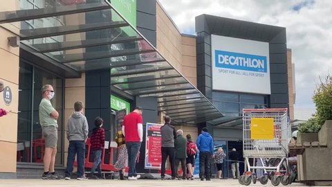 EDINBURGH, SCOTLAND - 11 July 2020 Shoppers Queuing to Enter a Branch of Decathlon Sport Shop After Scottish Coronavirus Lockdown Easing